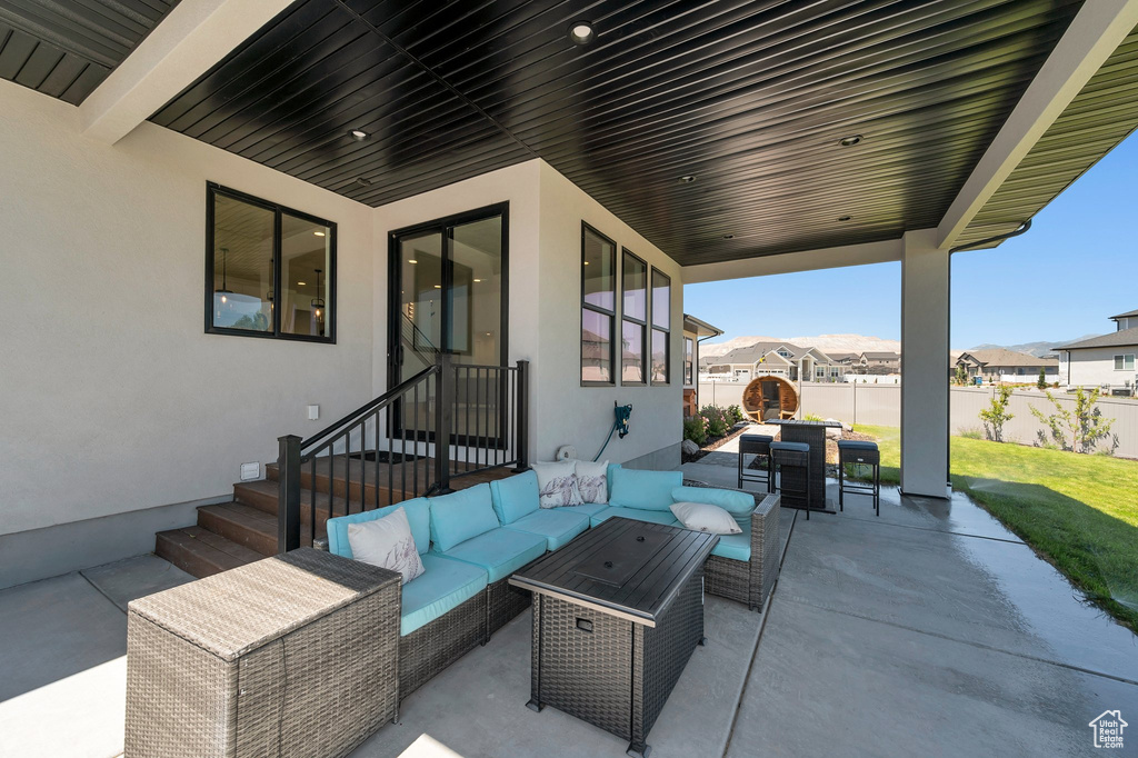 View of patio with outdoor lounge area