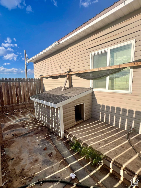 View of side of home with a patio area