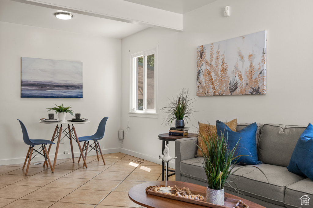 Living room featuring light tile patterned flooring