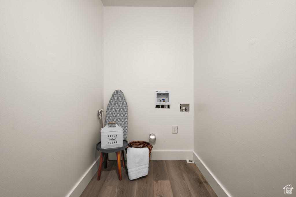 Washroom featuring hookup for a washing machine and wood-type flooring