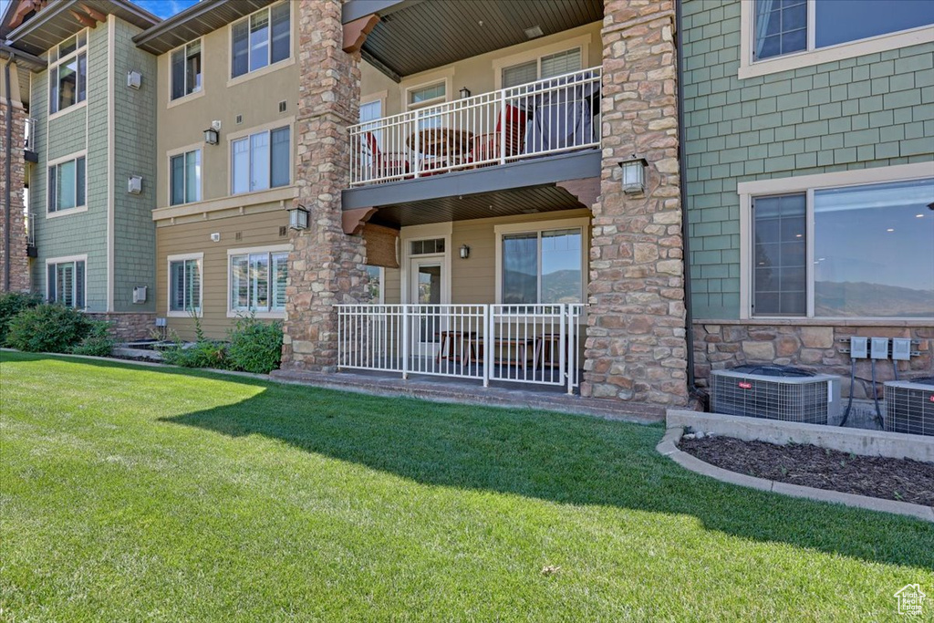 View of property featuring central AC unit