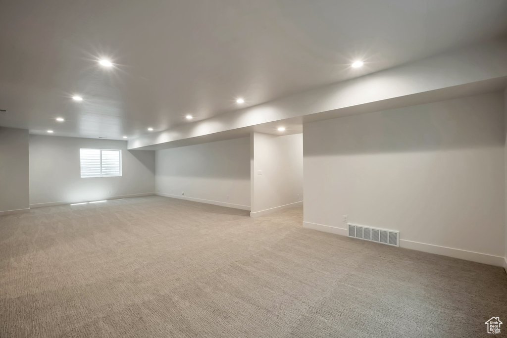 Basement featuring carpet floors