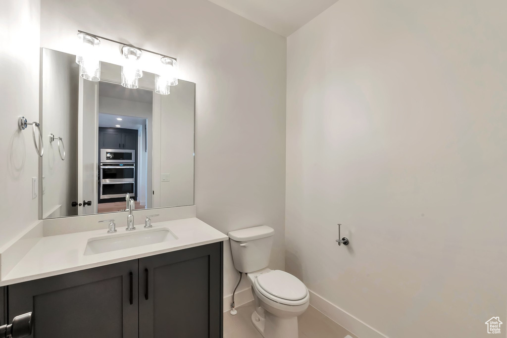 Bathroom featuring toilet and vanity