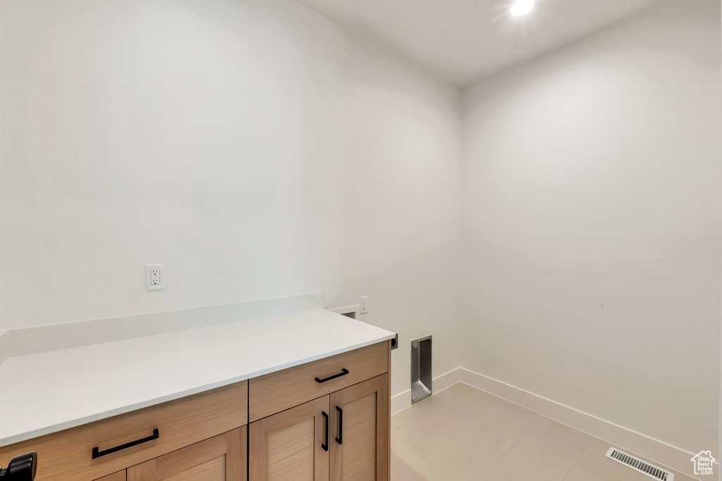 Interior space featuring tile patterned floors