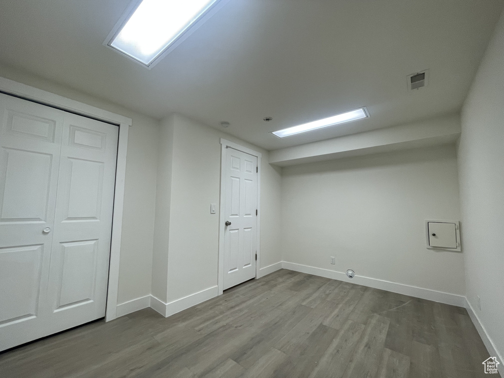 Interior space featuring hardwood / wood-style flooring and a closet