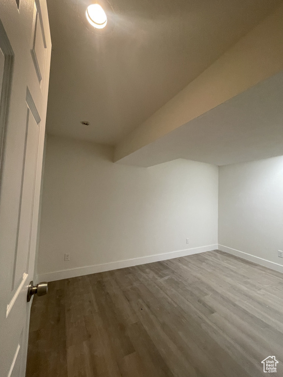 Additional living space with hardwood / wood-style flooring