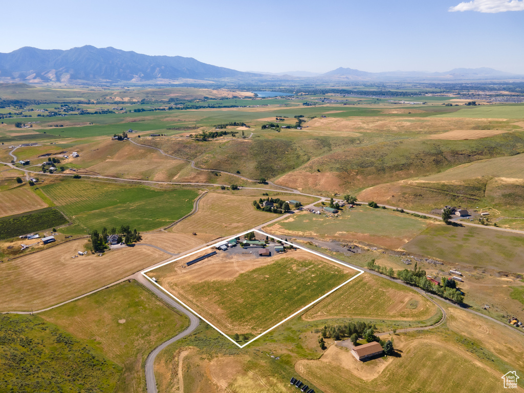 Drone / aerial view with a mountain view and a rural view