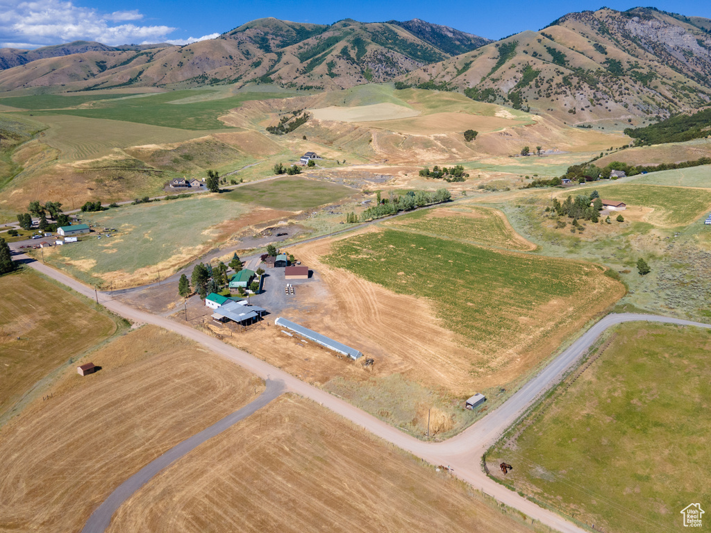 Drone / aerial view with a mountain view and a rural view