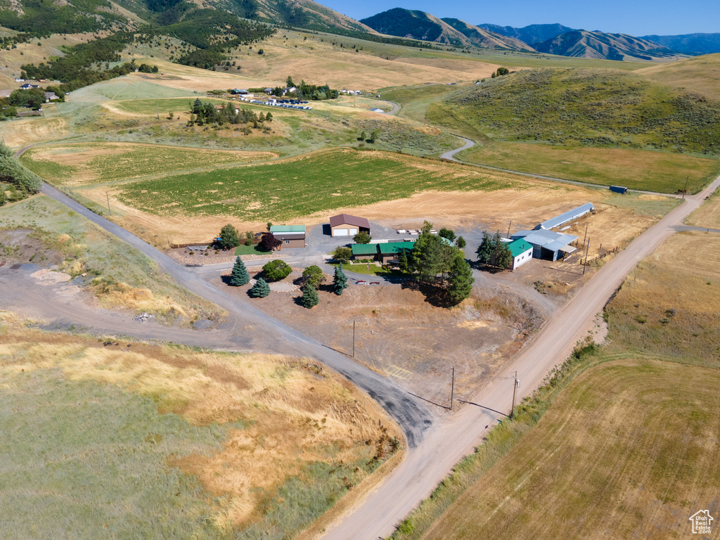 Drone / aerial view featuring a mountain view and a rural view