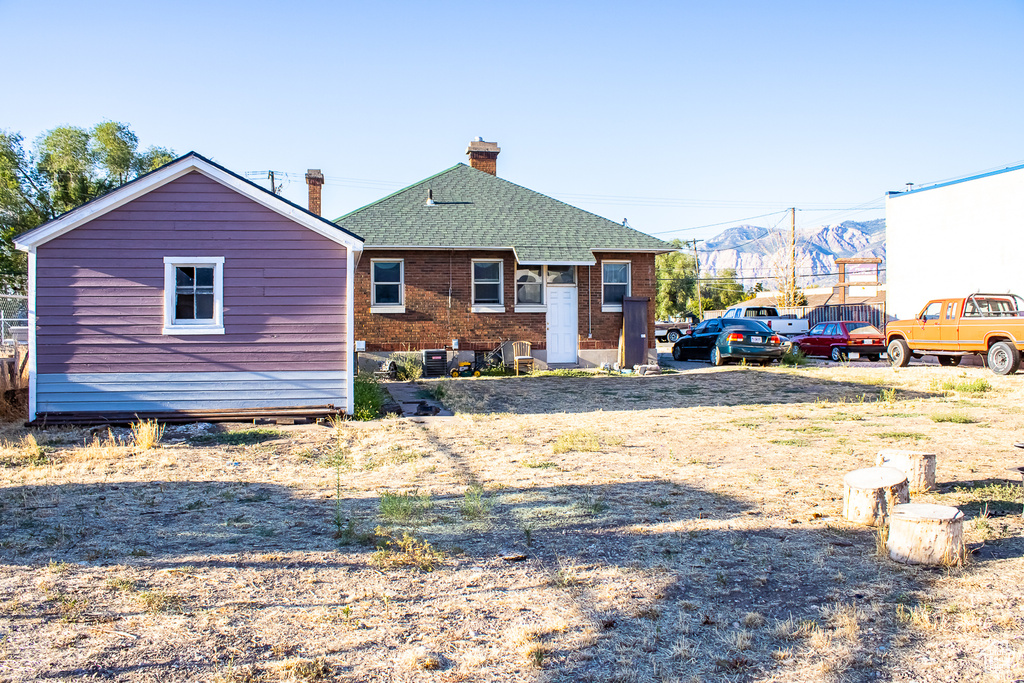 View of front of house featuring an outbuilding