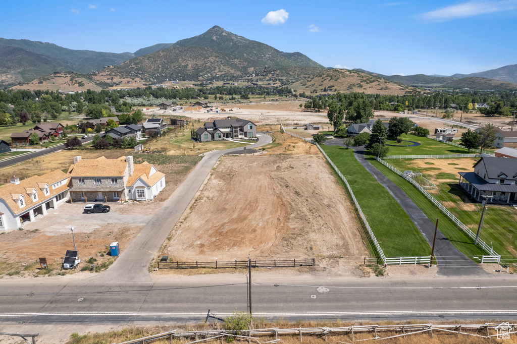 Birds eye view of property featuring a mountain view