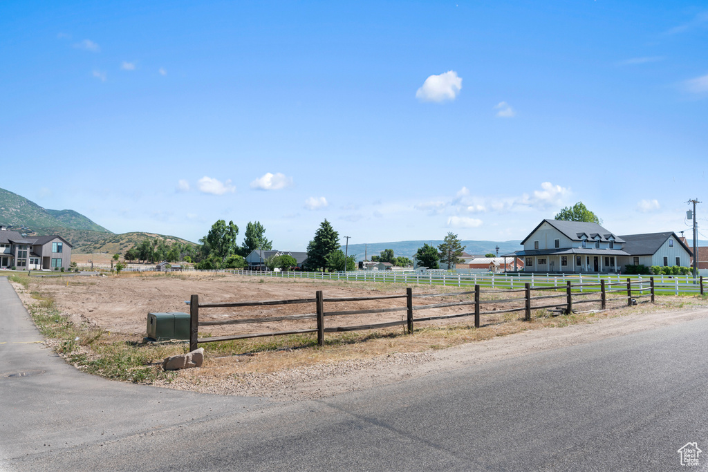 View of street with a mountain view and a rural view