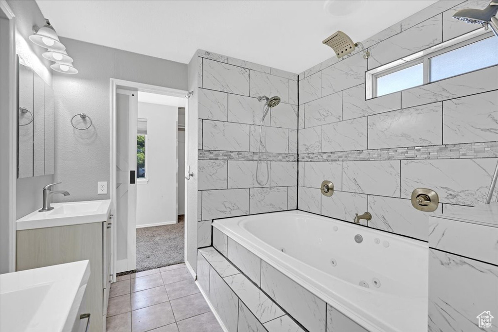 Bathroom with vanity and tile patterned flooring