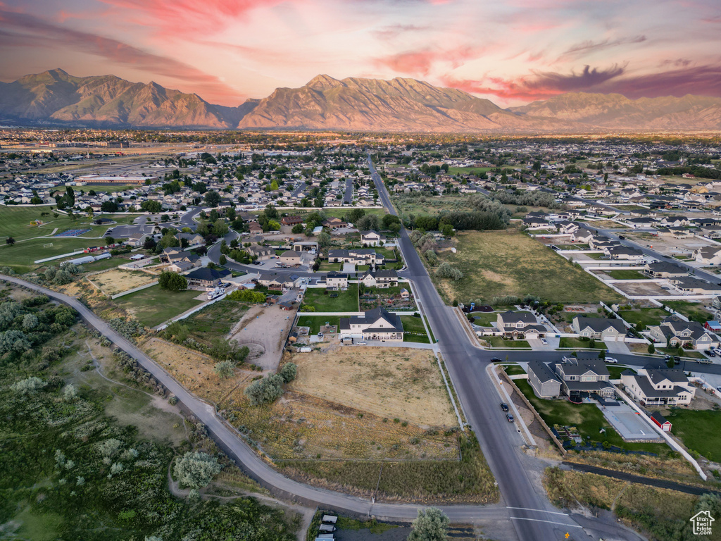 Aerial view at dusk with a mountain view