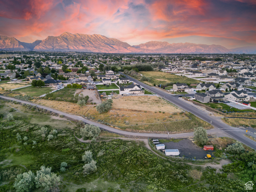 Aerial view at dusk with a mountain view