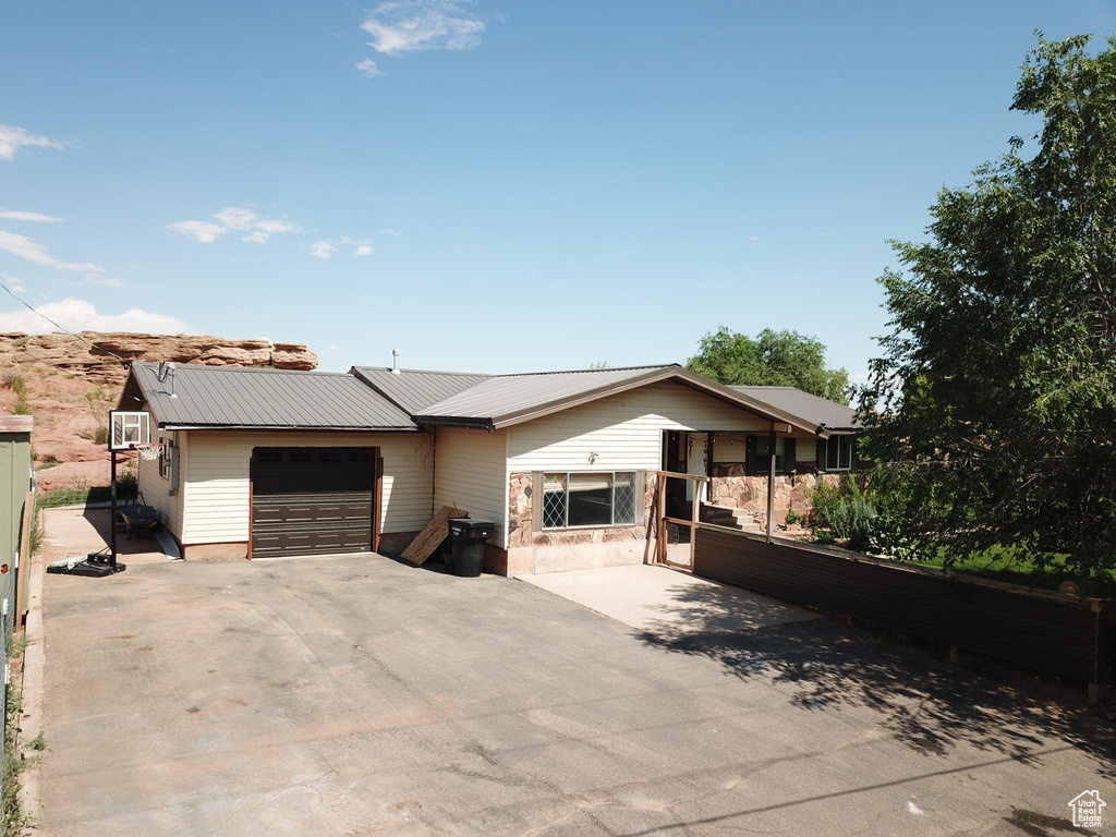 Ranch-style home with a garage