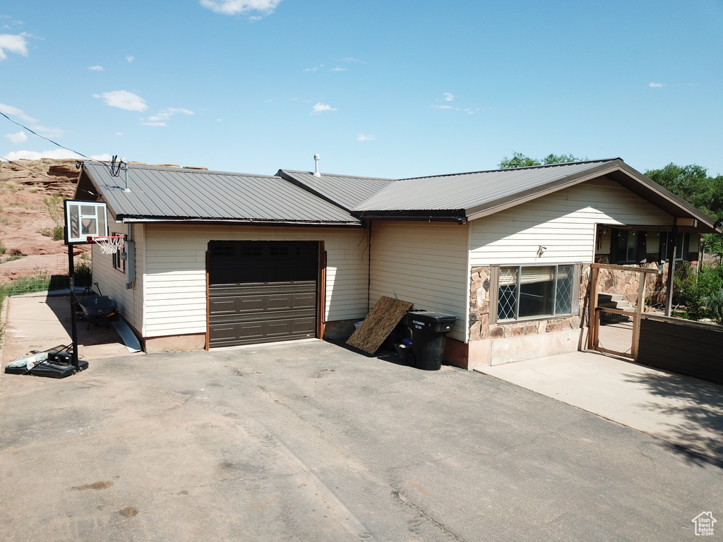 Ranch-style home with a garage