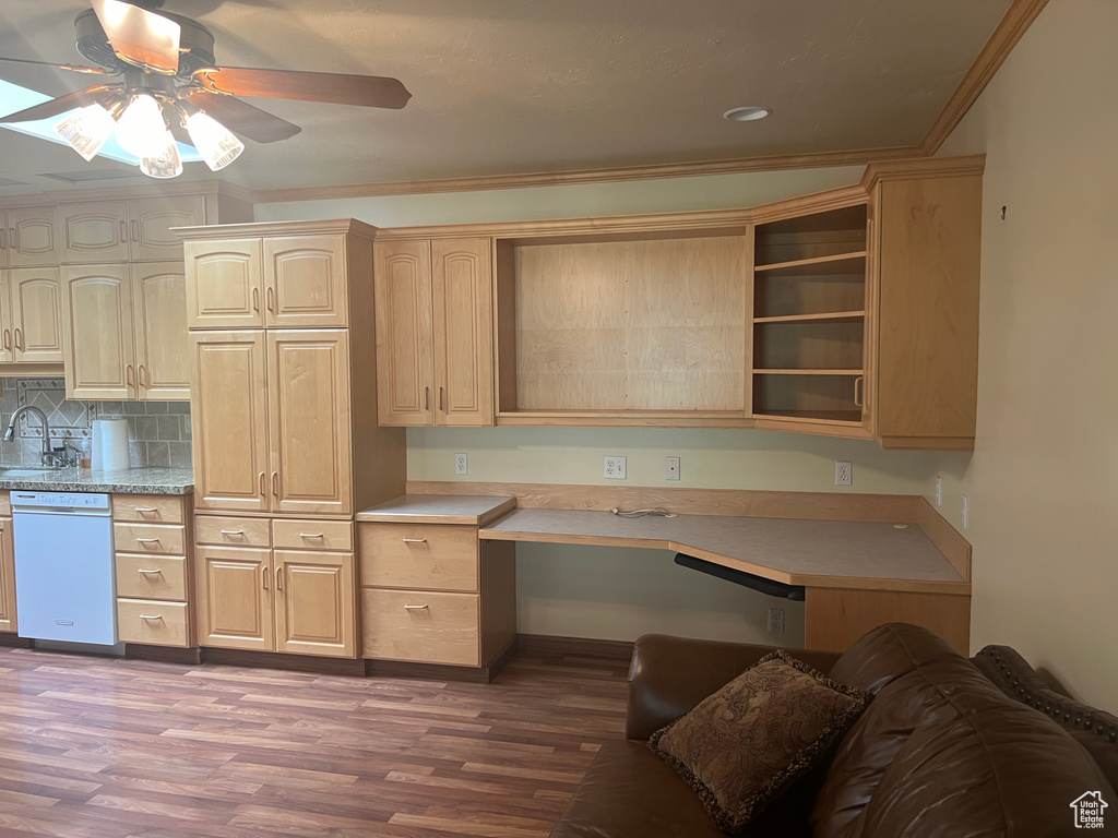 Kitchen with dark hardwood / wood-style flooring, built in desk, light brown cabinetry, dishwasher, and ceiling fan