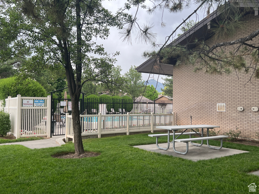 View of yard with a community pool