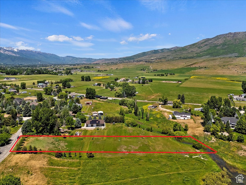 Aerial view featuring a mountain view and a rural view