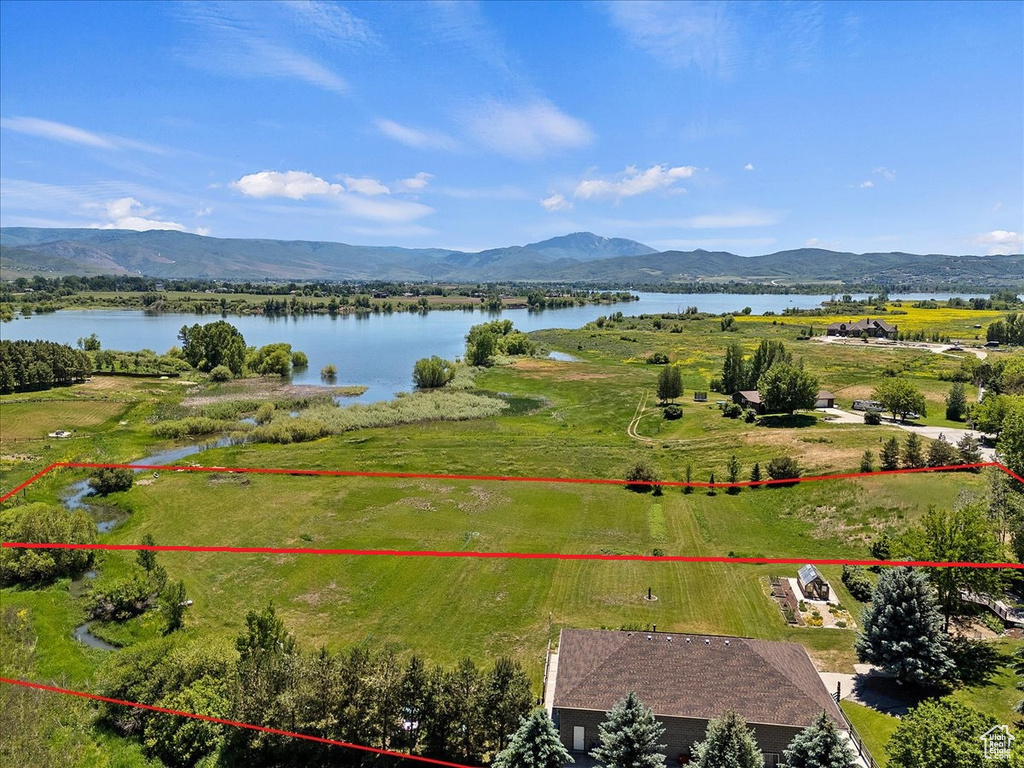 Bird\\\\\\\'s eye view with a water and mountain view and a rural view