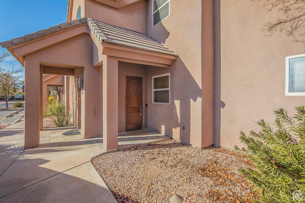 Entrance to property with a patio