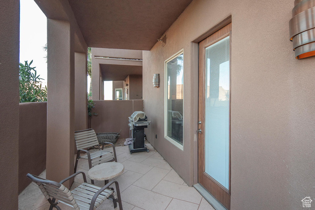 Balcony with grilling area and a patio