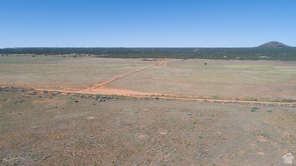 Birds eye view of property featuring a rural view