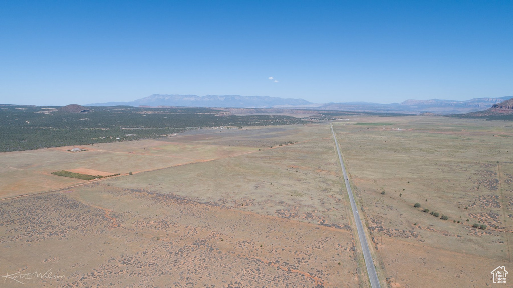 Drone / aerial view featuring a mountain view and a rural view