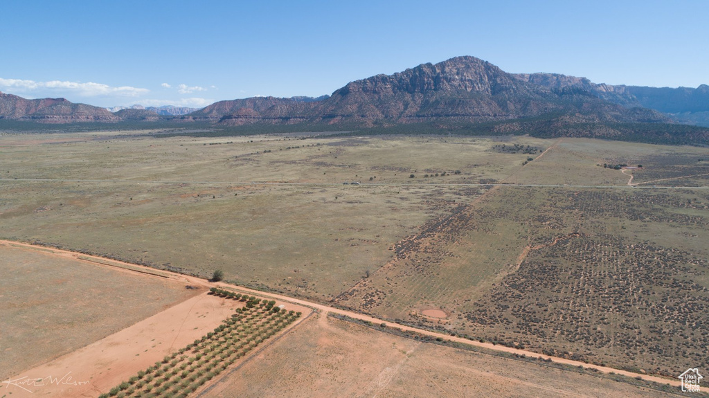 Property view of mountains with a rural view