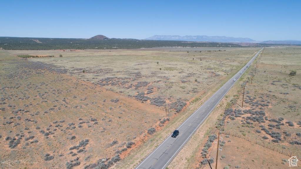 Drone / aerial view featuring a mountain view and a rural view