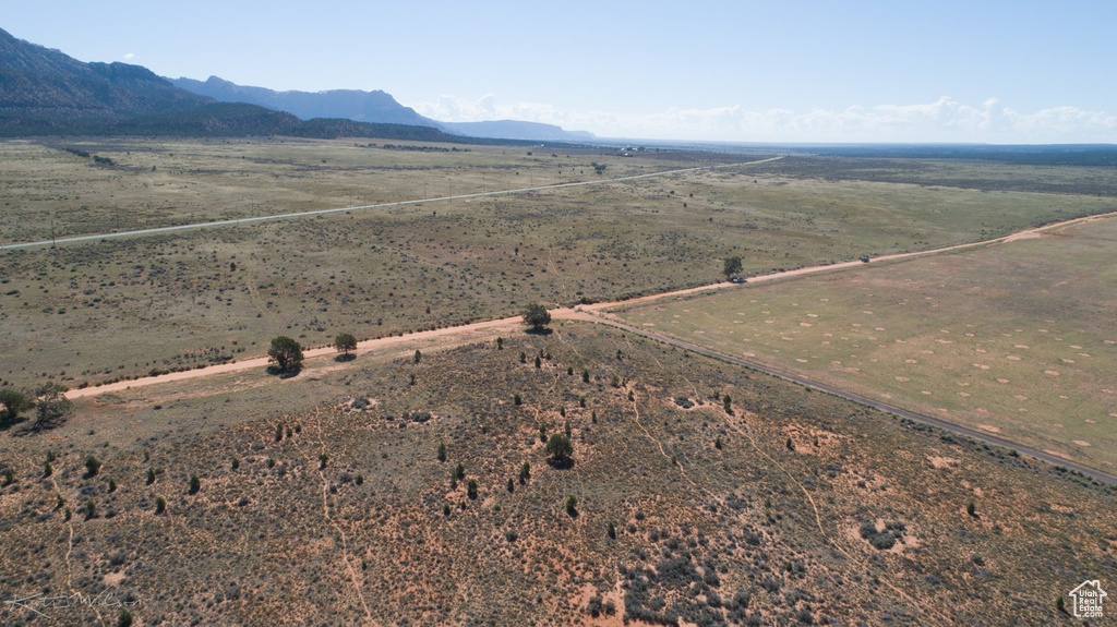 Birds eye view of property featuring a mountain view and a rural view