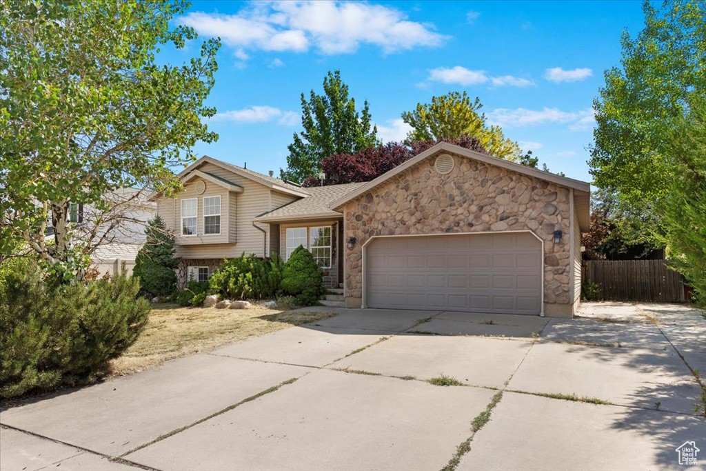 View of front of home with a garage