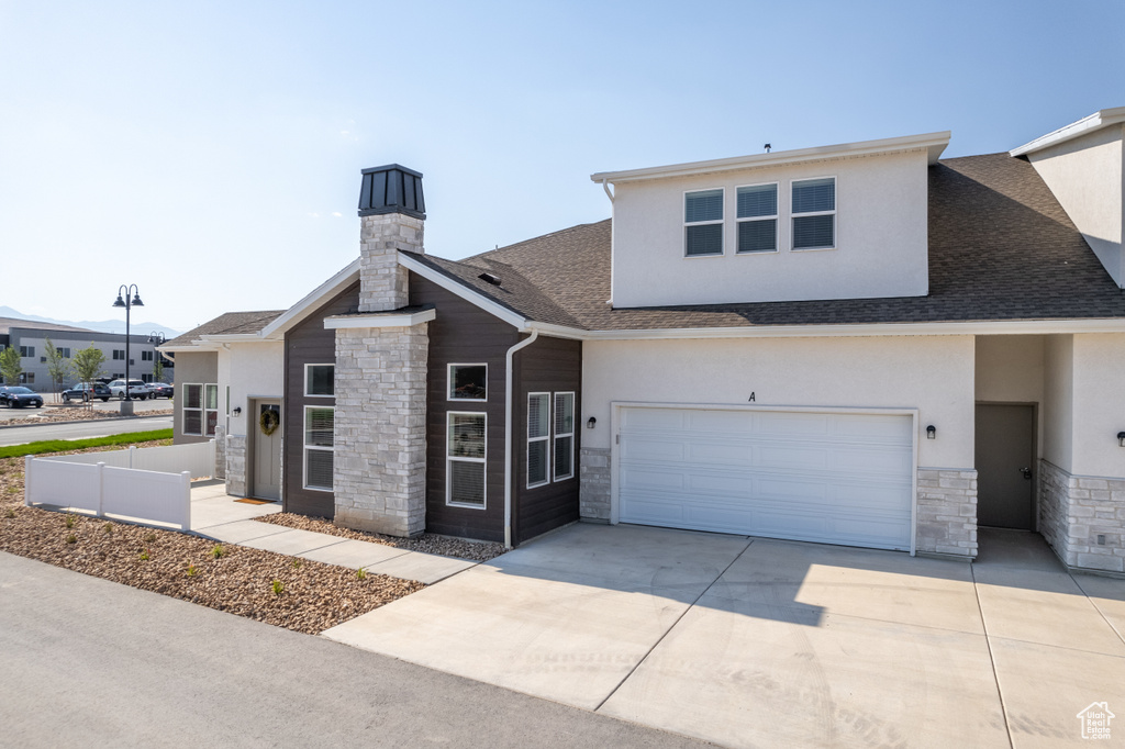 View of front of house with a garage