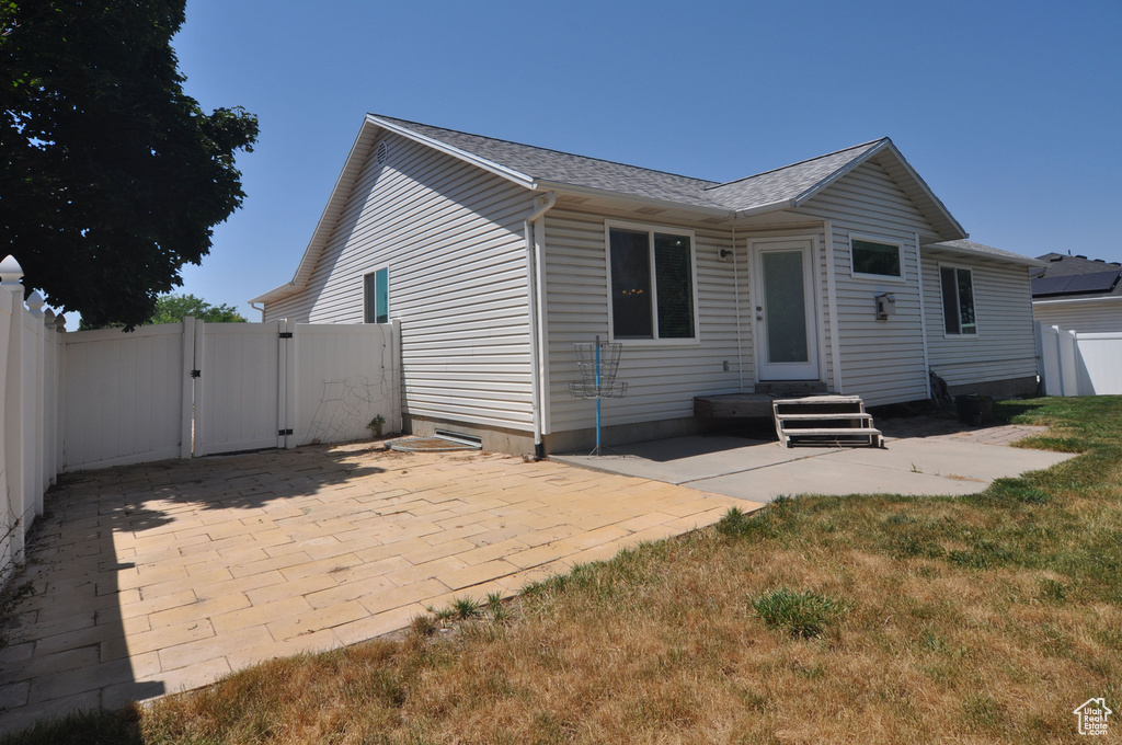 Back of property featuring a patio