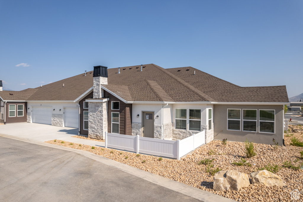 Ranch-style house with a garage