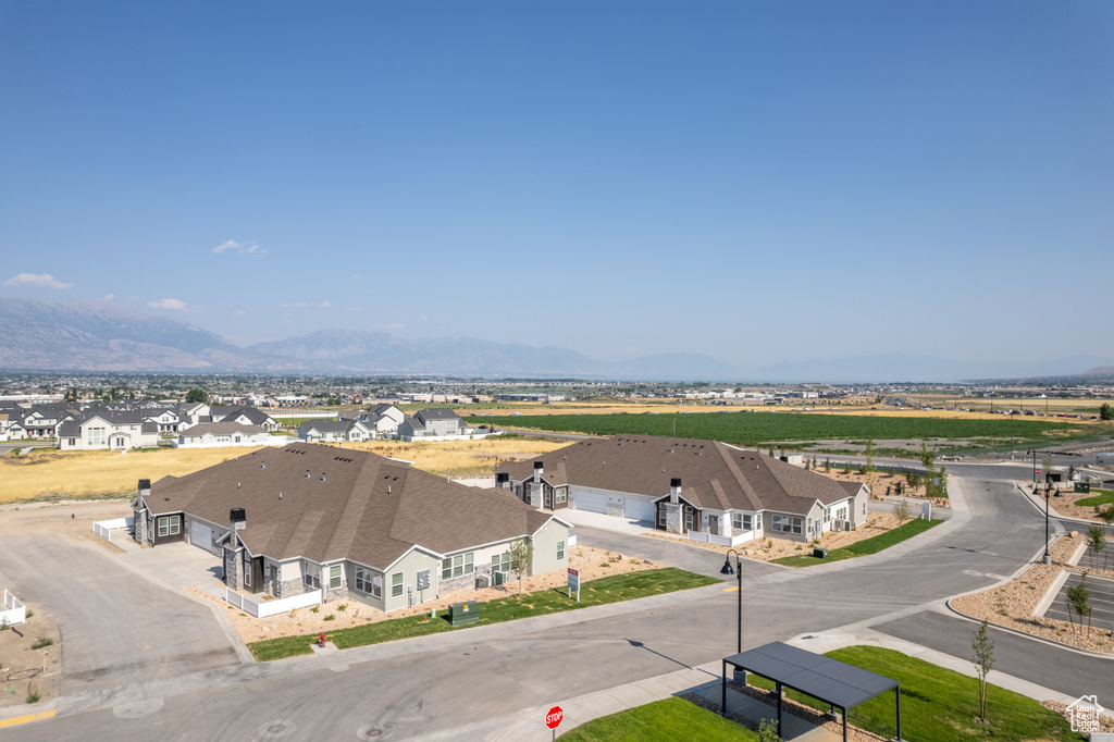 Birds eye view of property featuring a mountain view