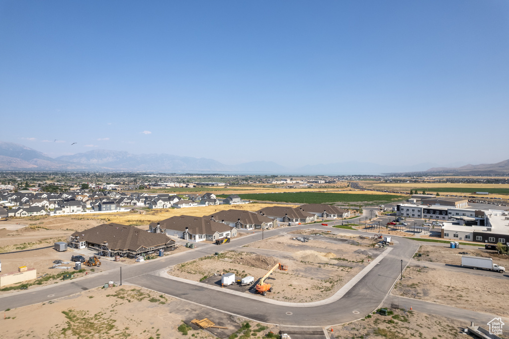 Birds eye view of property with a mountain view