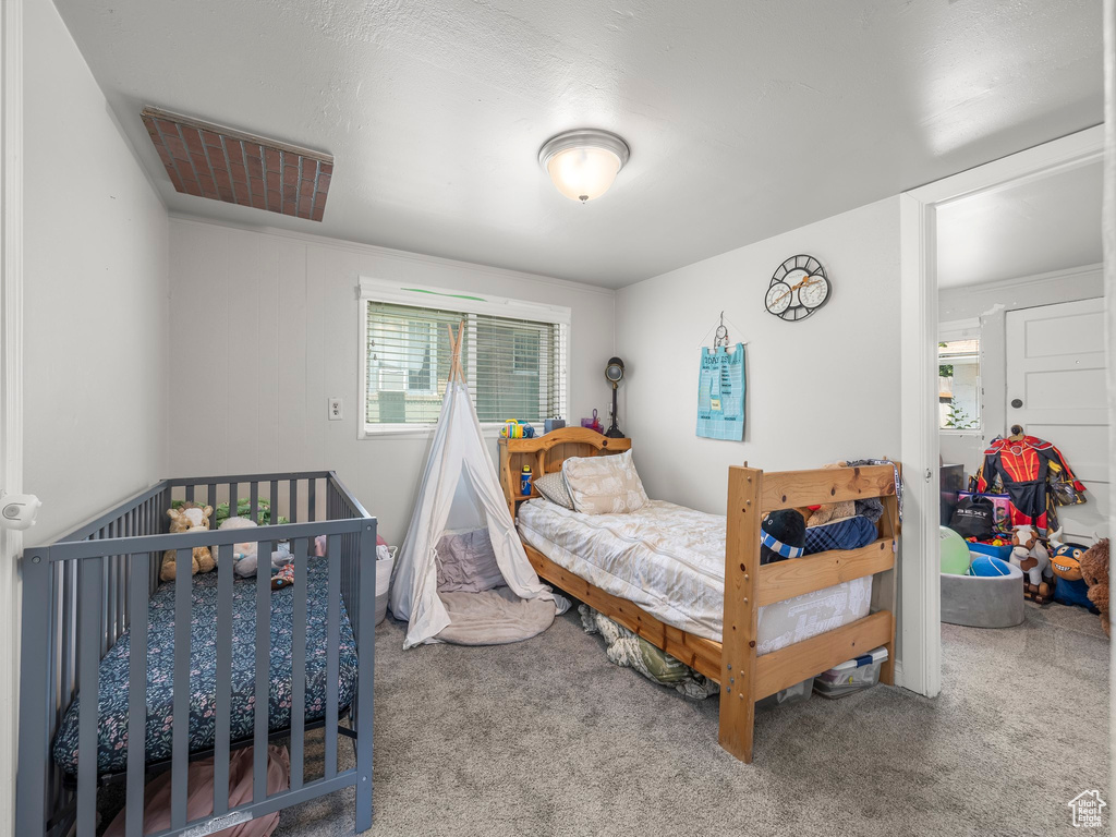 View of carpeted bedroom