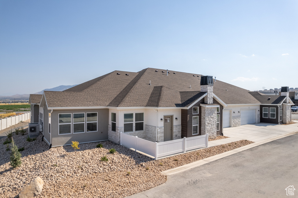 View of front of home with a garage