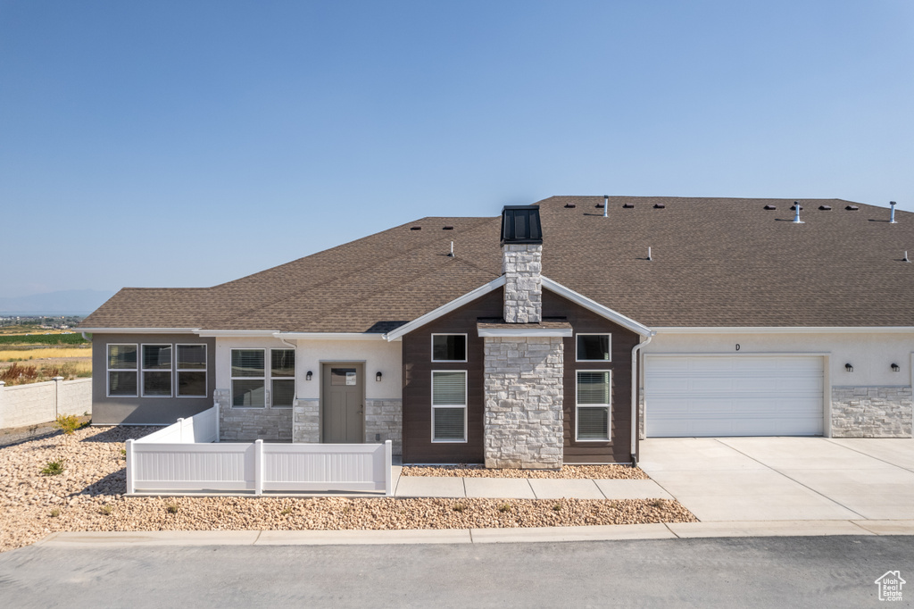 View of front of property with a garage