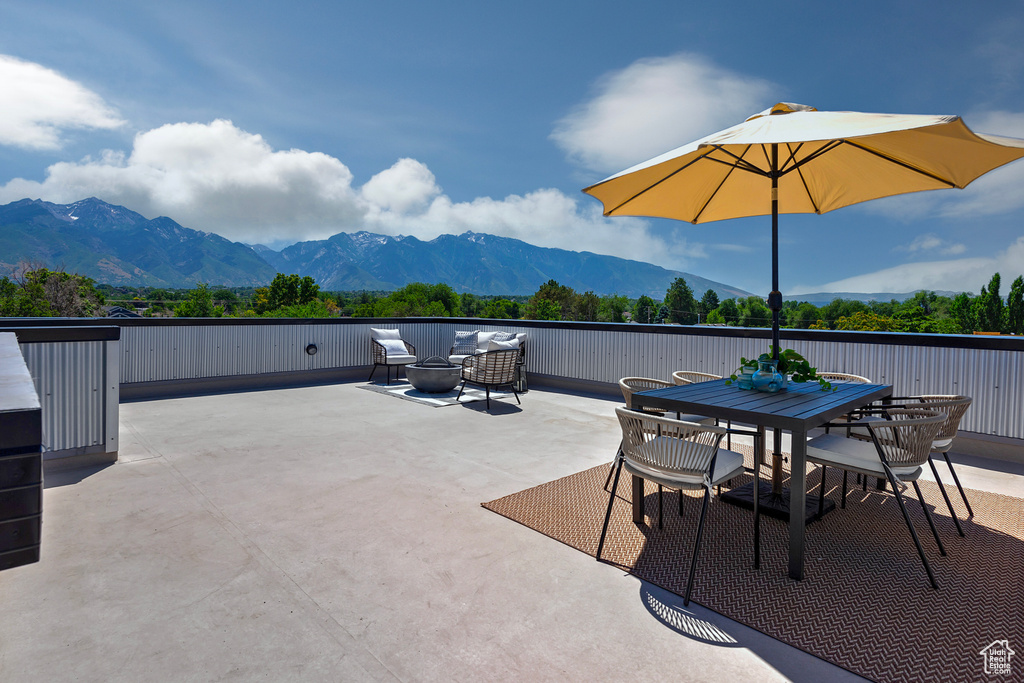 View of patio / terrace with a mountain view