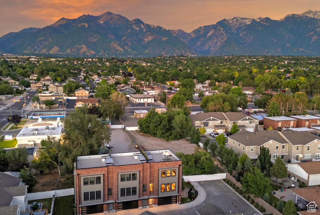 Aerial view at dusk with a mountain view