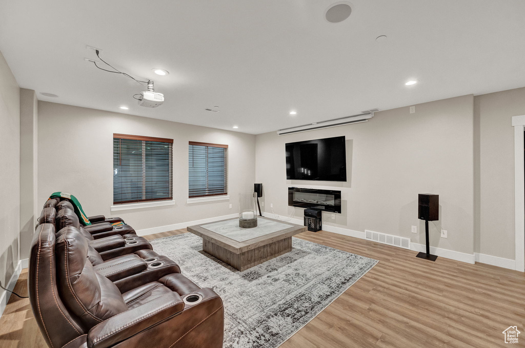 Living room with light wood-type flooring