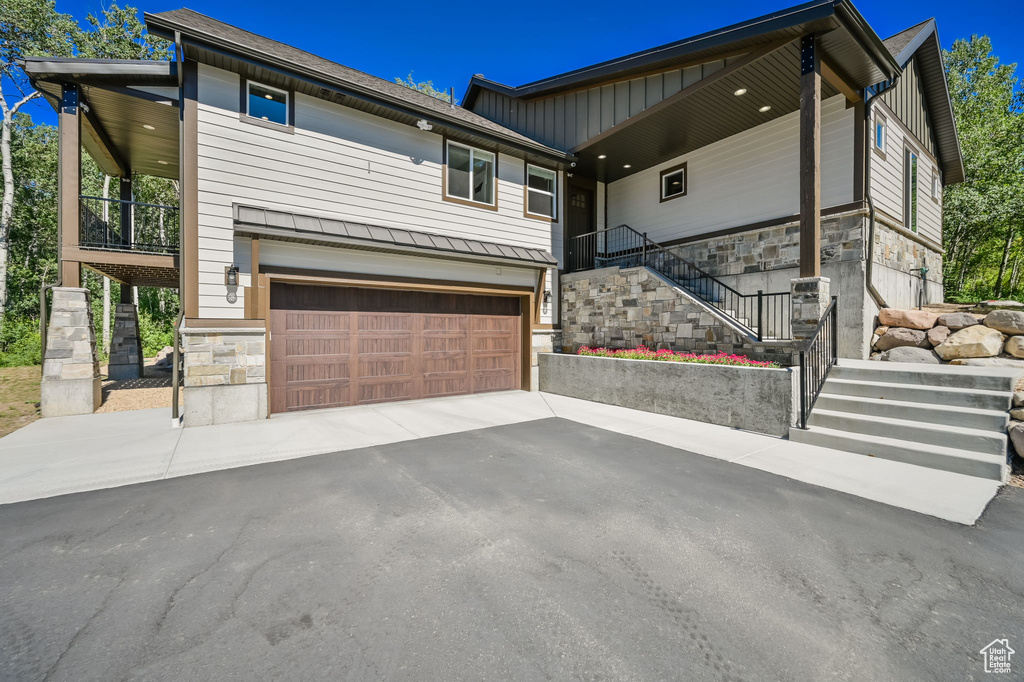 View of front of house with a garage