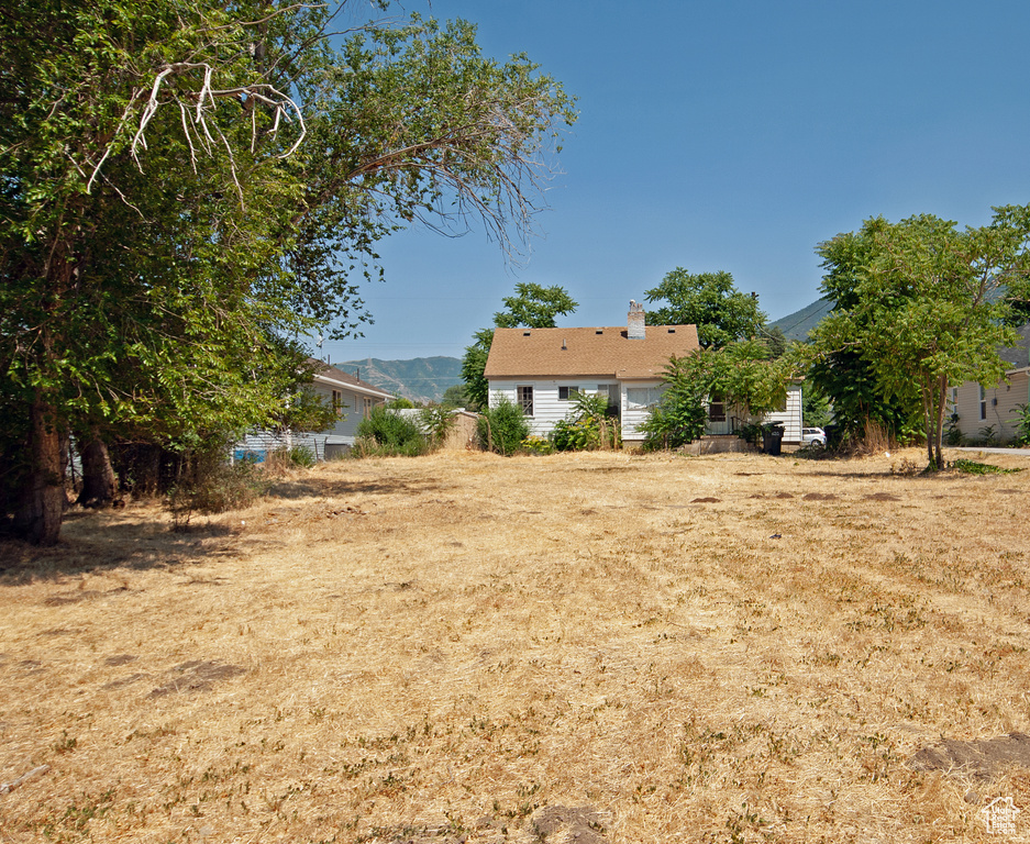 View of yard with a mountain view