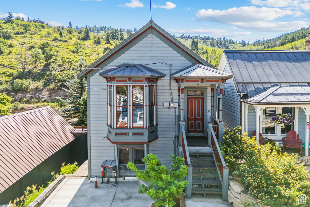 View of front of home with a patio