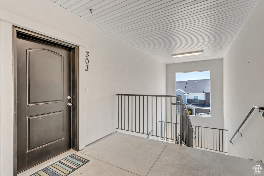 Doorway to property featuring a balcony