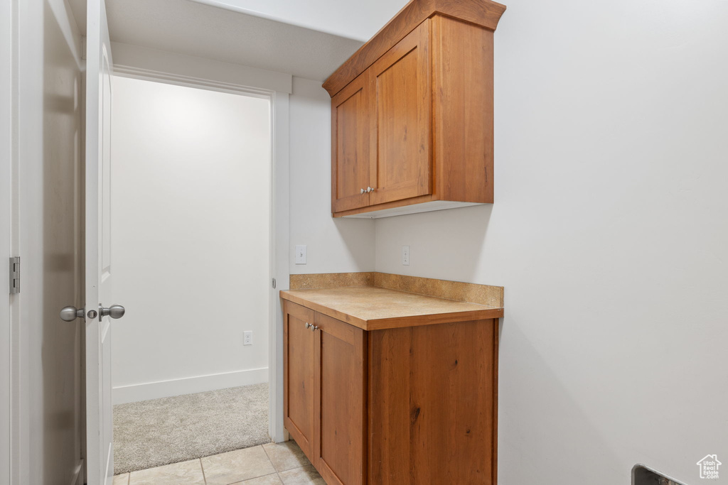 Interior space featuring light tile patterned floors