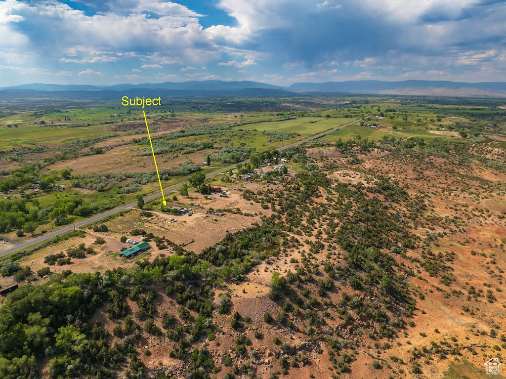 Drone / aerial view featuring a mountain view and a rural view